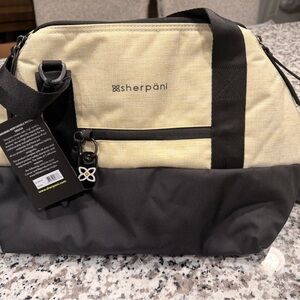 Sherpani Two-Tone Black and Cream Travel Bag